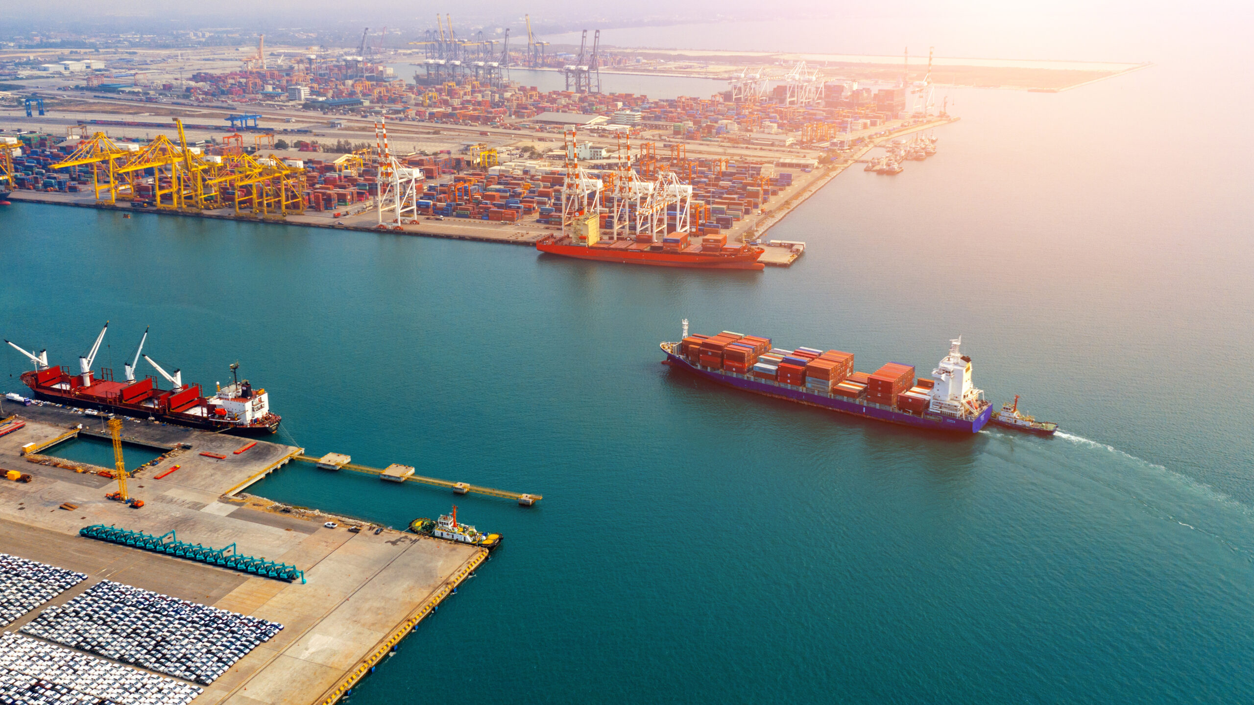 Aerial view of container cargo ship in sea.